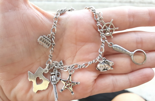 Charms to celebrate moving to central Texas, shooting rattlesnakes, writing my newest story about a Texas Ranger, love of rabbits, joining AMW, and writing Rota Fortunae.